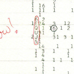 A section of a handwritten sheet music with musical notes and annotations in pencil and red ink.