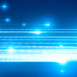 A digital blue background with glowing horizontal lines and light flares creating a futuristic effect.