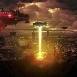 A large city with a bunch of flying objects